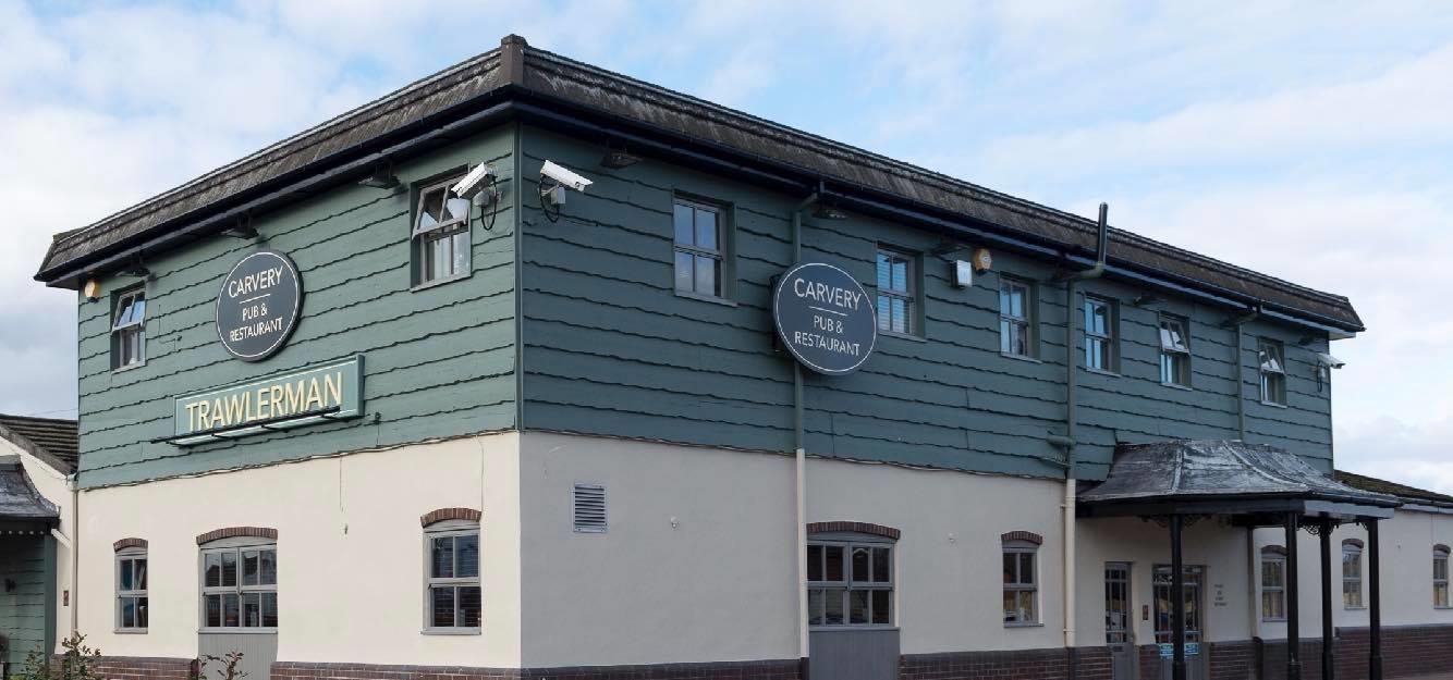 Image of a building with a sign on the side