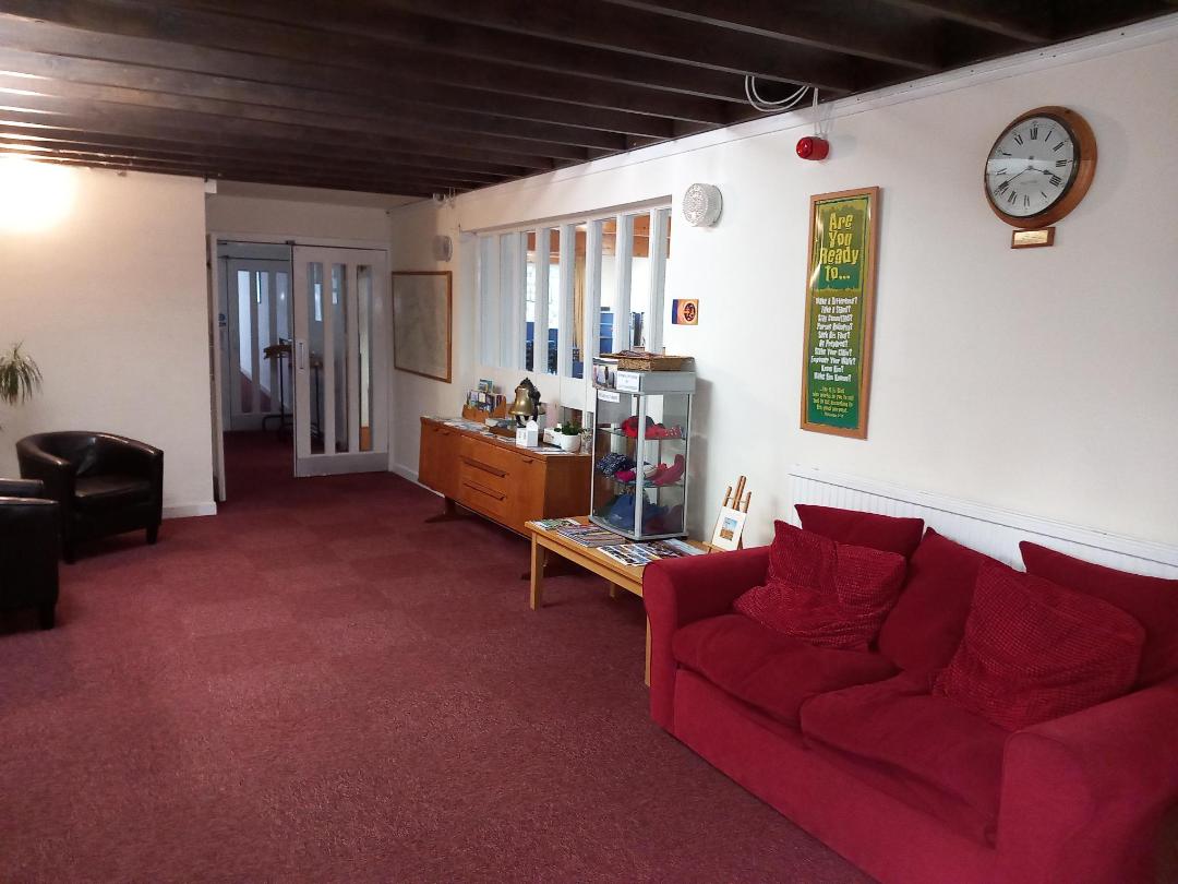 Image of a settee and armchairs in a lobby