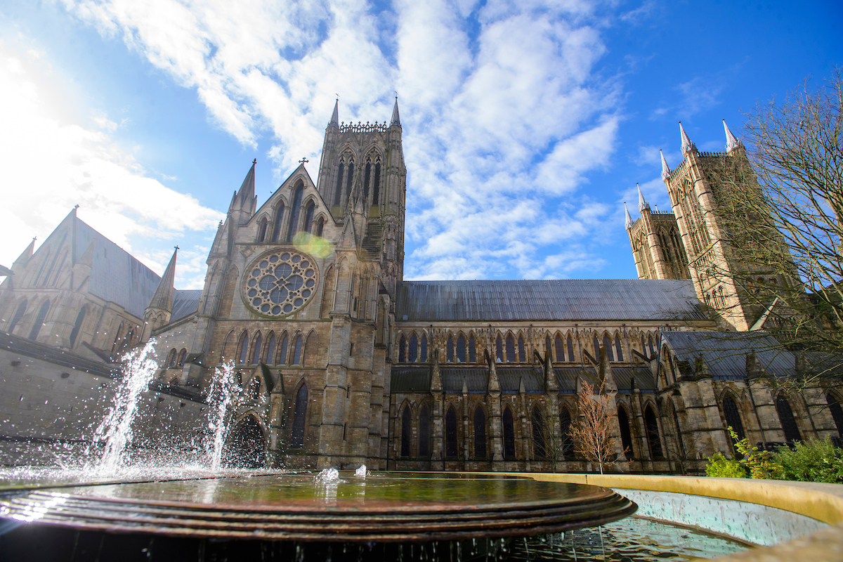 Lincoln Cathedral from the Dean's Green - a tranquil outdoor space with water feature, paths and seating