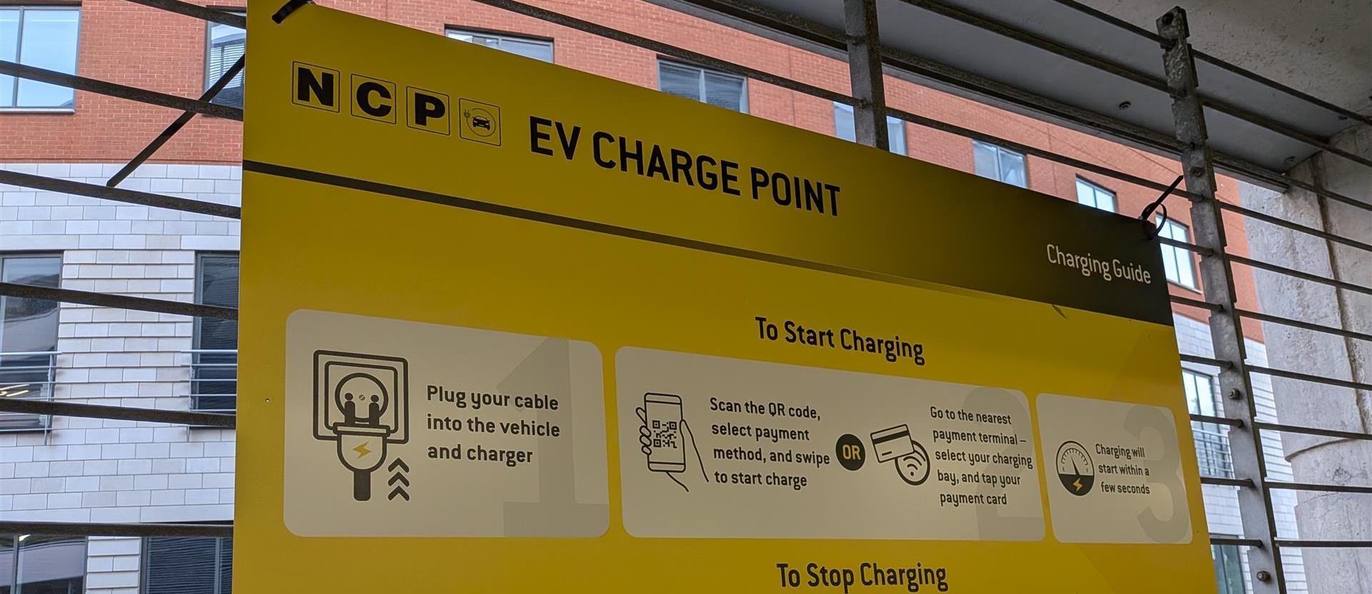 image of sign explaining electric vehicle charging point