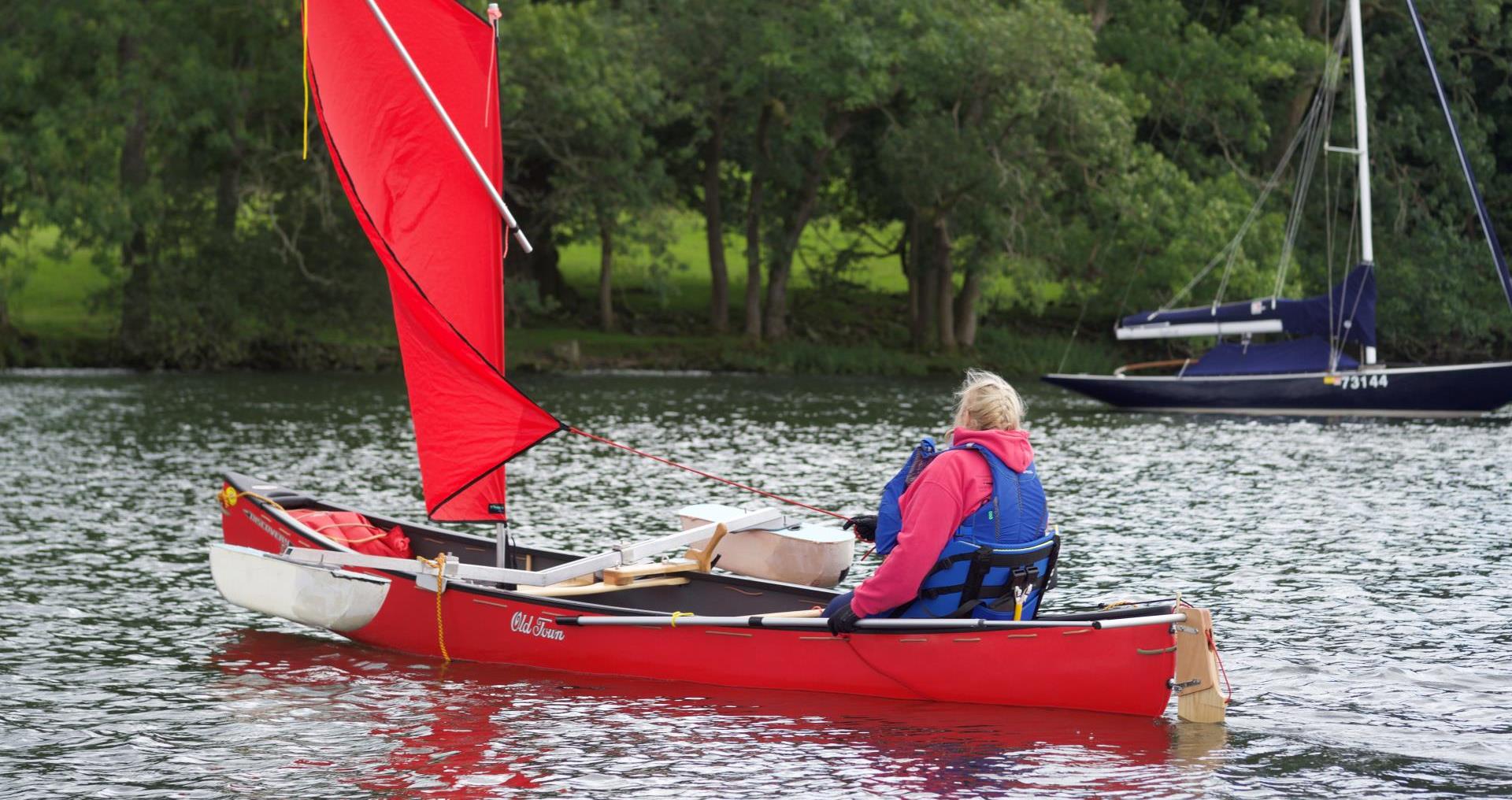 accessible canoeing, with adapted seated and outriggers for stability
