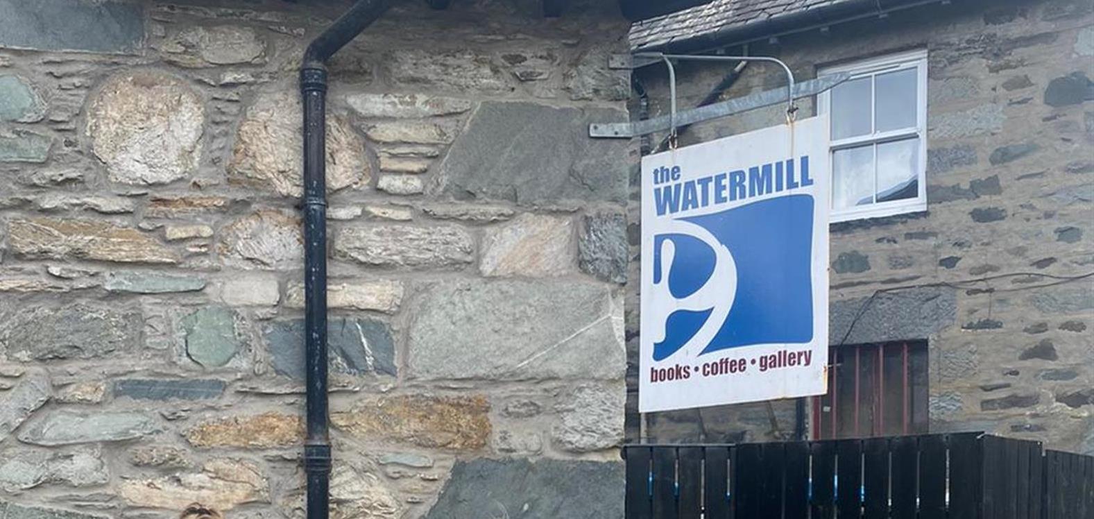 Image of people outside the Watermill